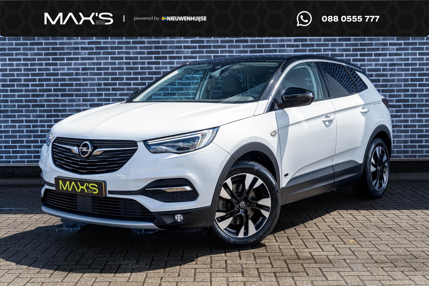 Opel Grandland X - 1.6 Turbo Hybrid4 Business Elegance | Trekhaak | Two-Tone | Navigatie | Keyless Entry | El - AutoWereld.nl