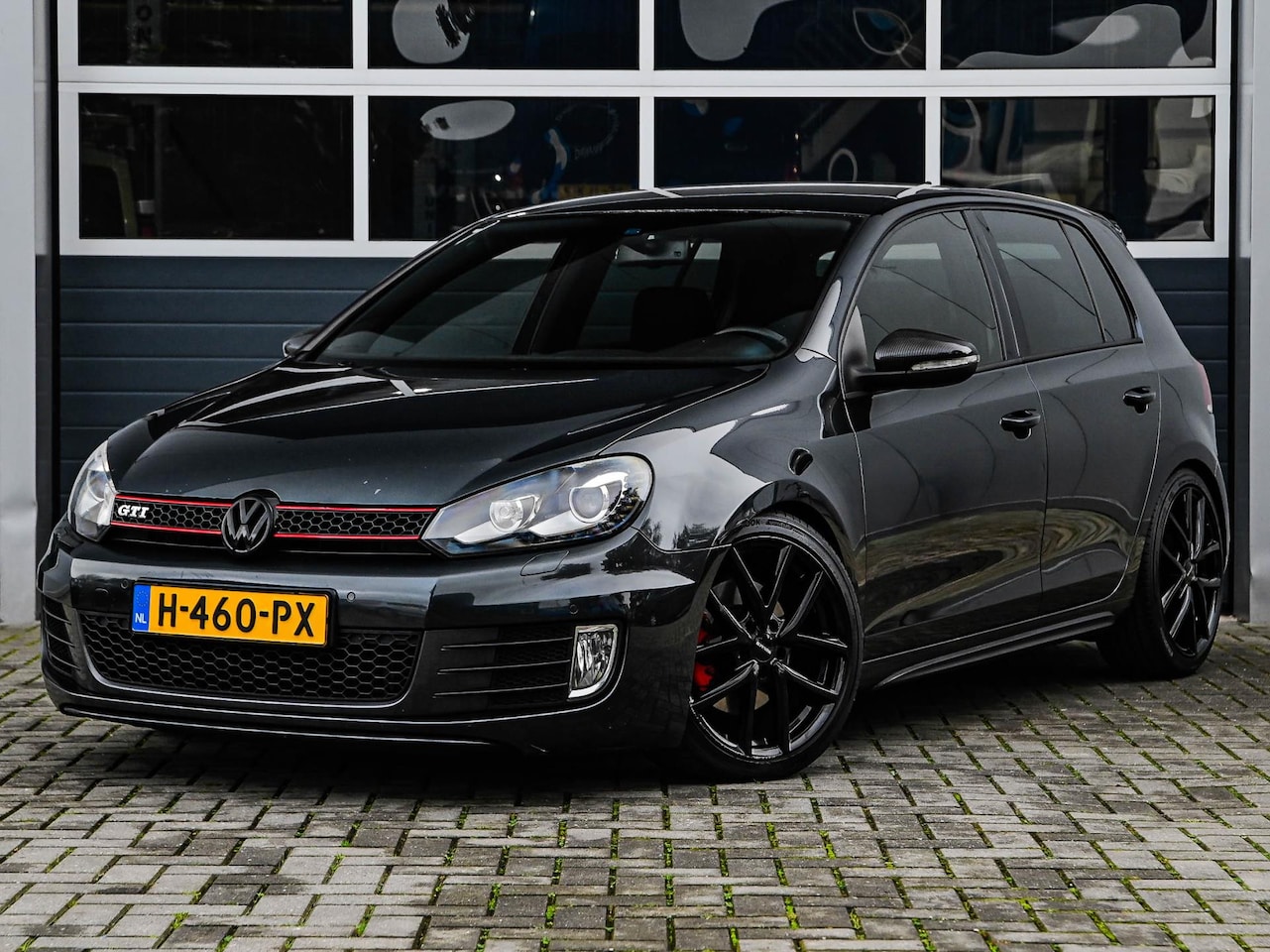 Volkswagen Golf - 2.0 GTI 300pk | DSG | Xenon | Navi | Climate control | Stoelverwarming | PDC - AutoWereld.nl