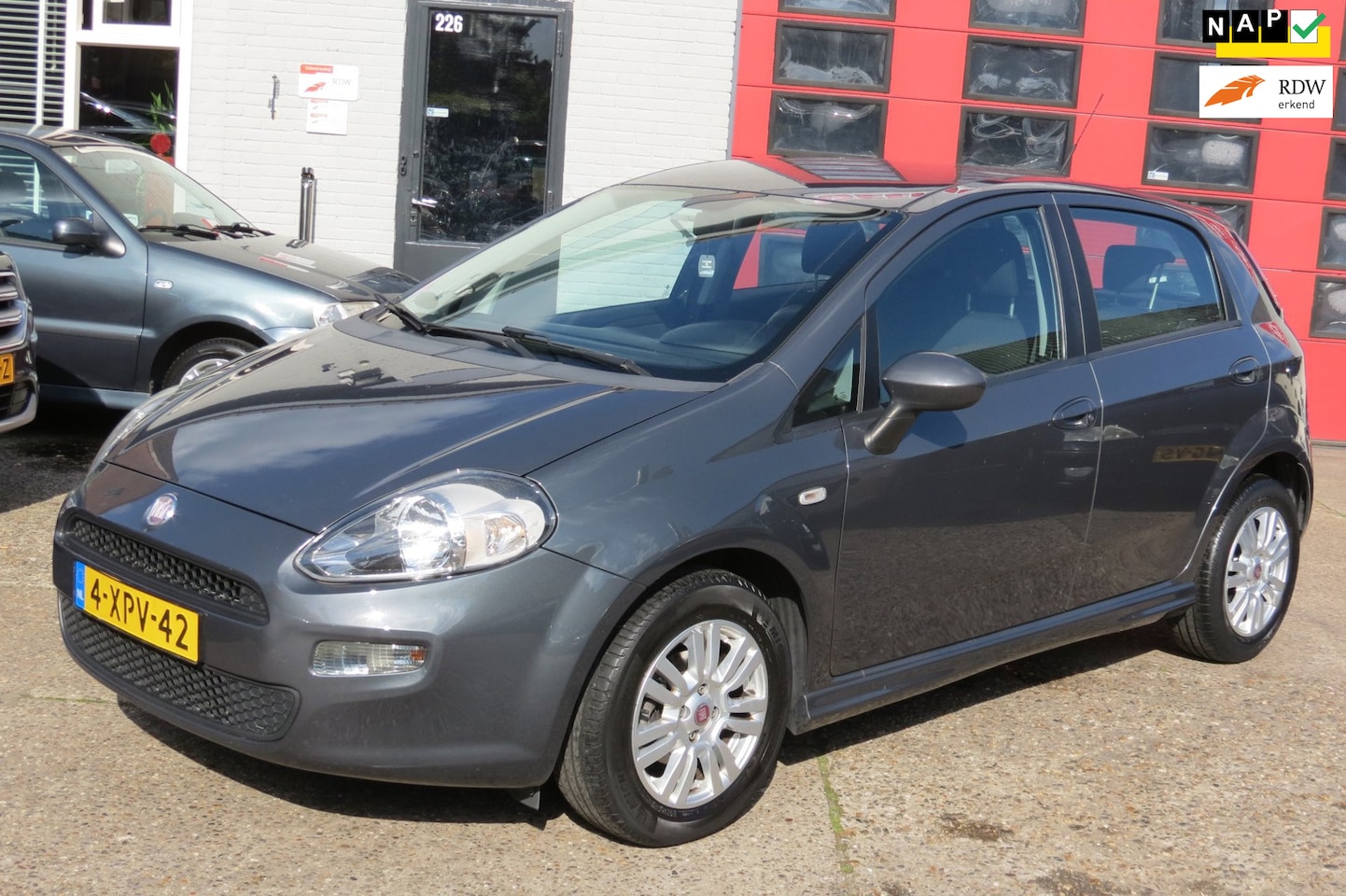 Fiat Punto Evo - 0.9 TwinAir Street 0.9 TwinAir Street , 5 DEURS , AIRCO , NWE APK - AutoWereld.nl