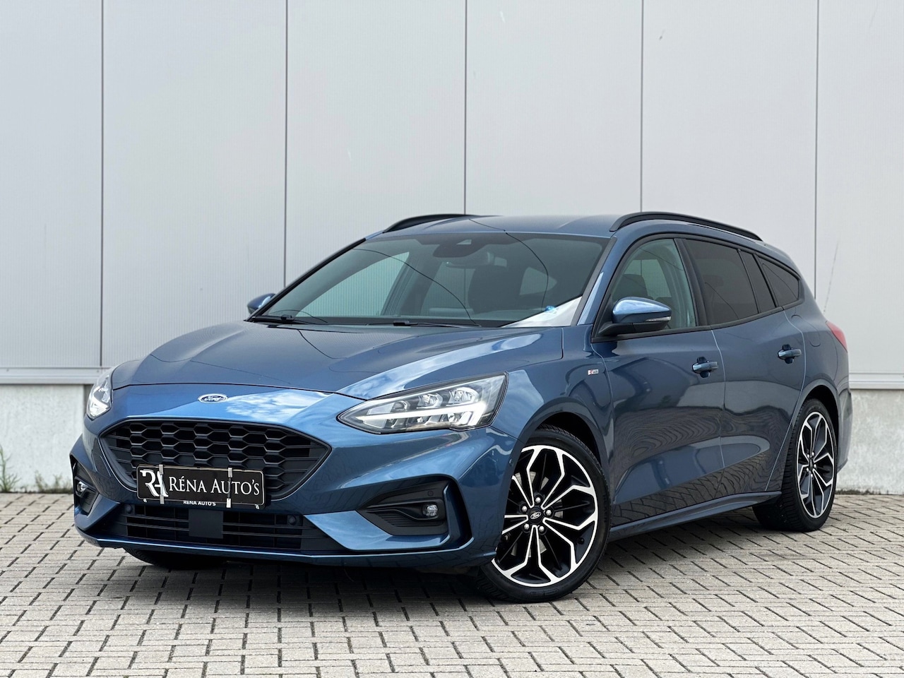 Ford Focus Wagon - 1.0 EcoBoost Titanium ST-Line | Automaat | Camera | Navi | Stoelverwarming | - AutoWereld.nl