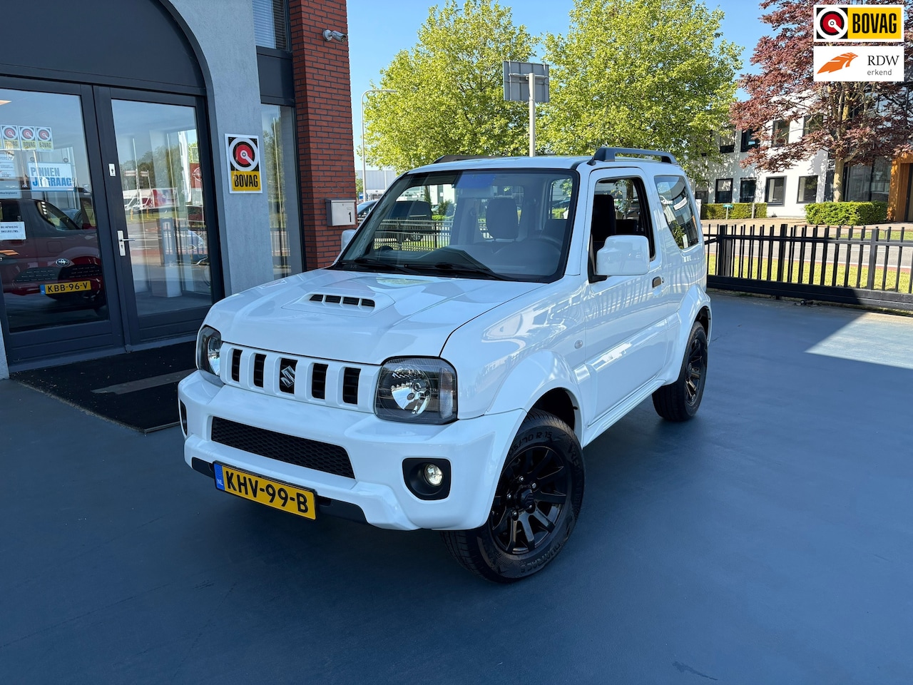 Suzuki Jimny - 1.3 Exclusive LMV NAVI AUTOMAAT - AutoWereld.nl