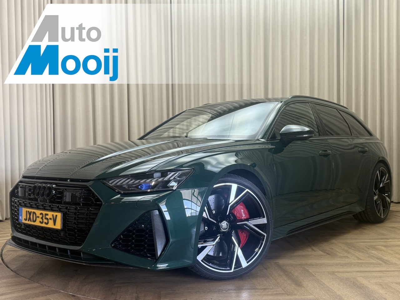 Audi RS6 - ///Sport C8 / Carbon / Ceramic / Goodwood Green / B&O / 22" Audi Sport / HUD / Pano / Stoe - AutoWereld.nl