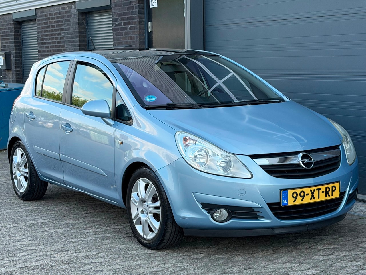 Opel Corsa - 1.4-16V Cosmo 5 deurs PANO AIRCO APK - AutoWereld.nl
