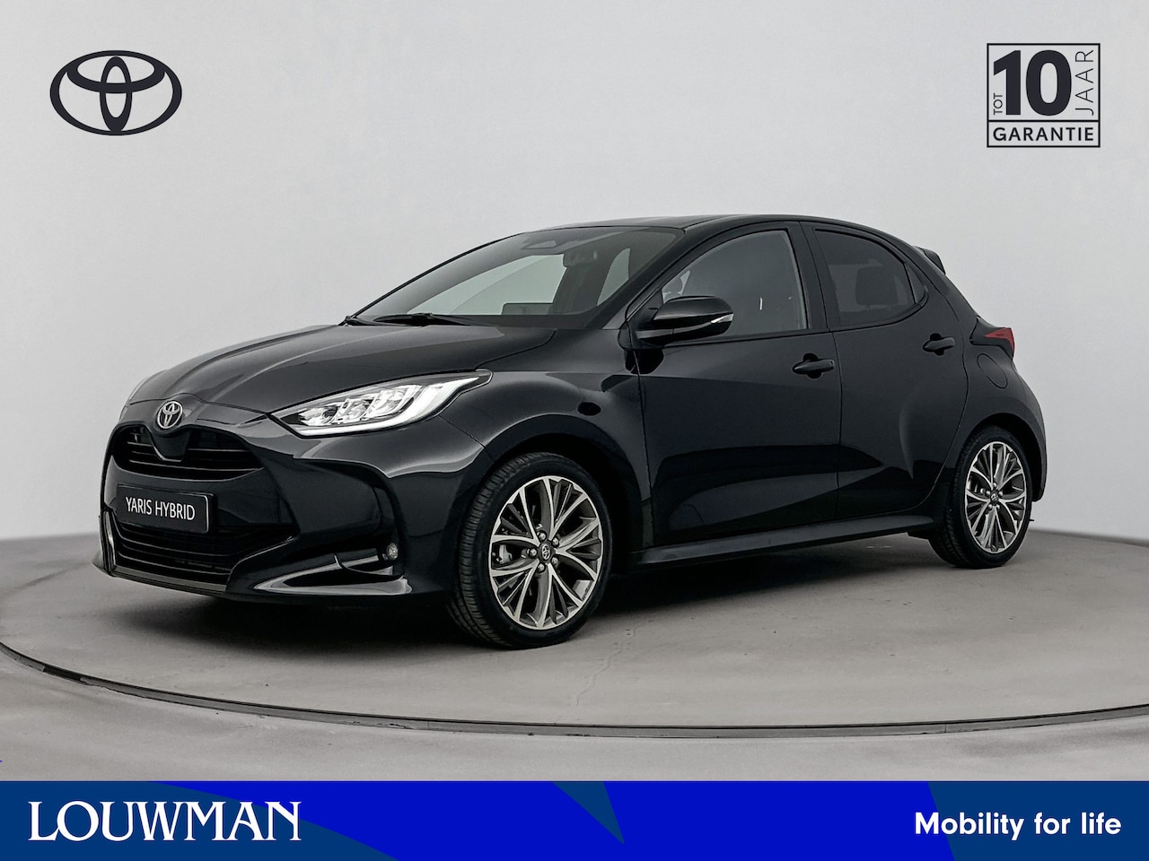 Toyota Yaris - 1.5 Hybrid Executive | Half lederen bekleding | Navigatie | 18 inch velgen | - AutoWereld.nl