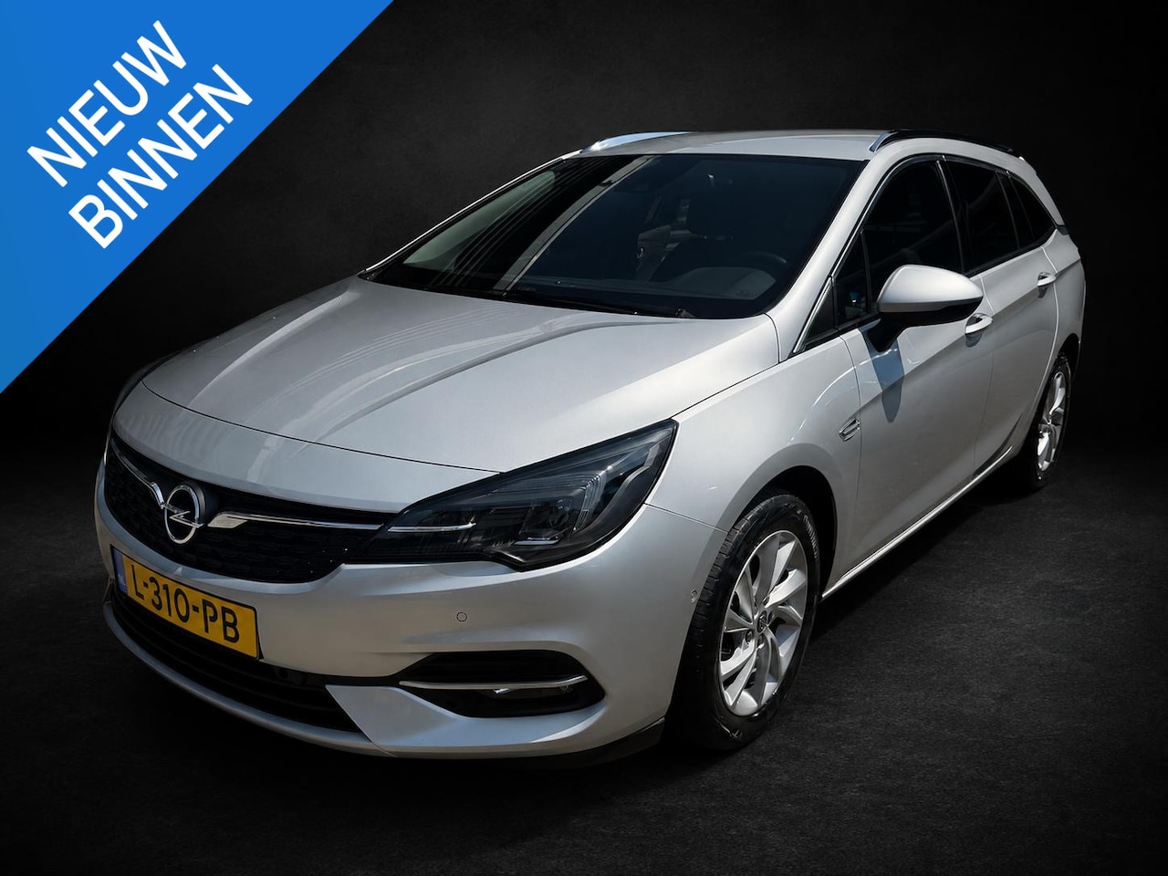 Opel Astra Sports Tourer - 1.2 Business Executive 1.2 Business Executive - AutoWereld.nl