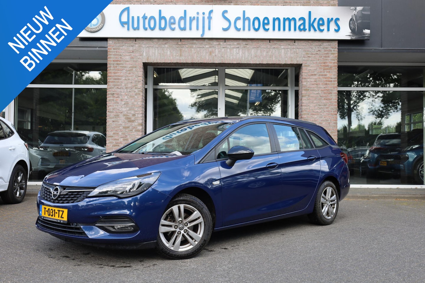 Opel Astra Sports Tourer - 1.2 TREKHAAK CAMERA ALL-SEASONS CARPLAY DAB CRUISE NAVI LMV 2xPDC AIRCO - AutoWereld.nl