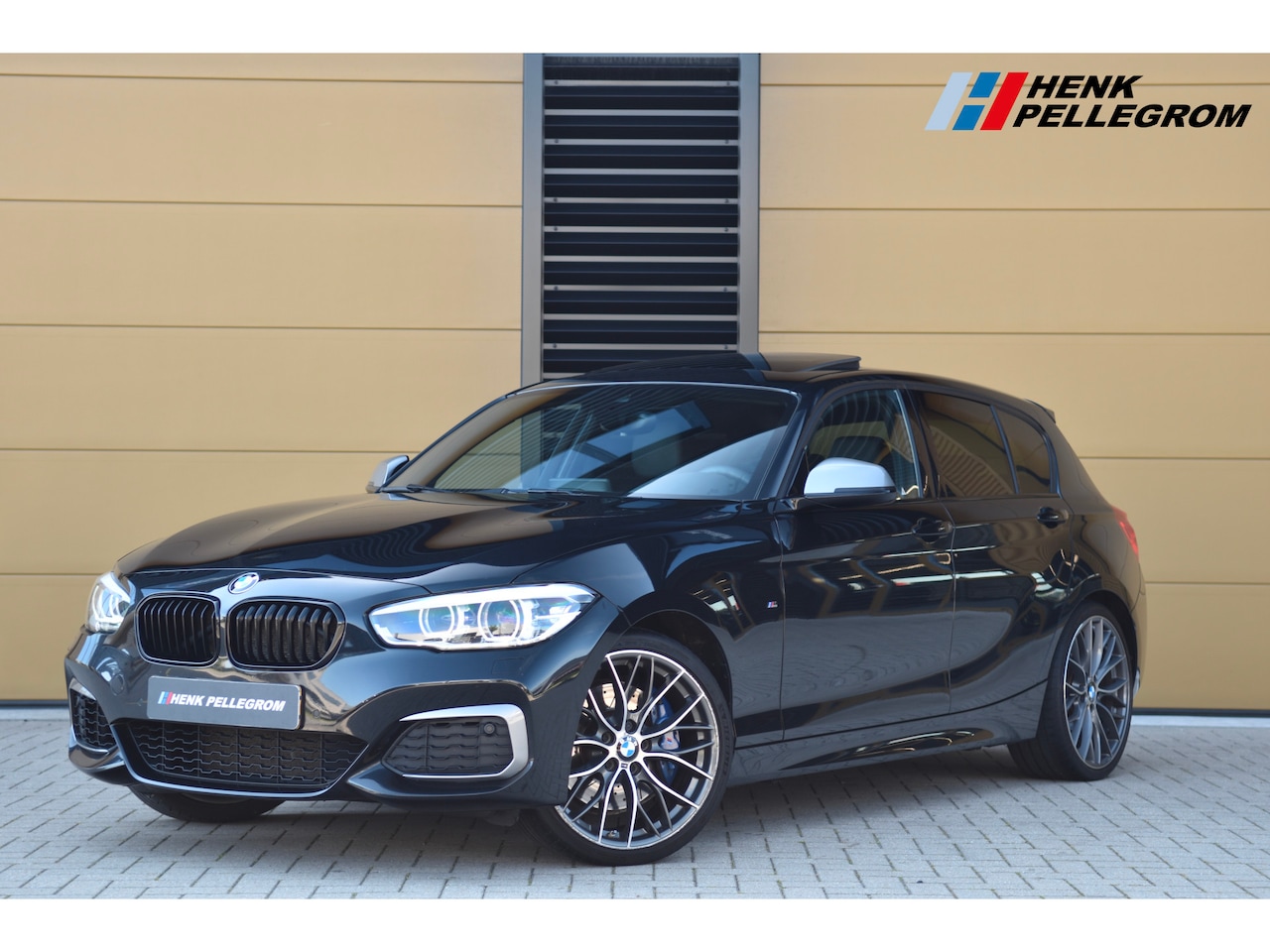 BMW 1-serie - M140i xDrive High Executive * Schuifdak * M-Performance Uitlaat * Harman/Kardon * M-Sportr - AutoWereld.nl