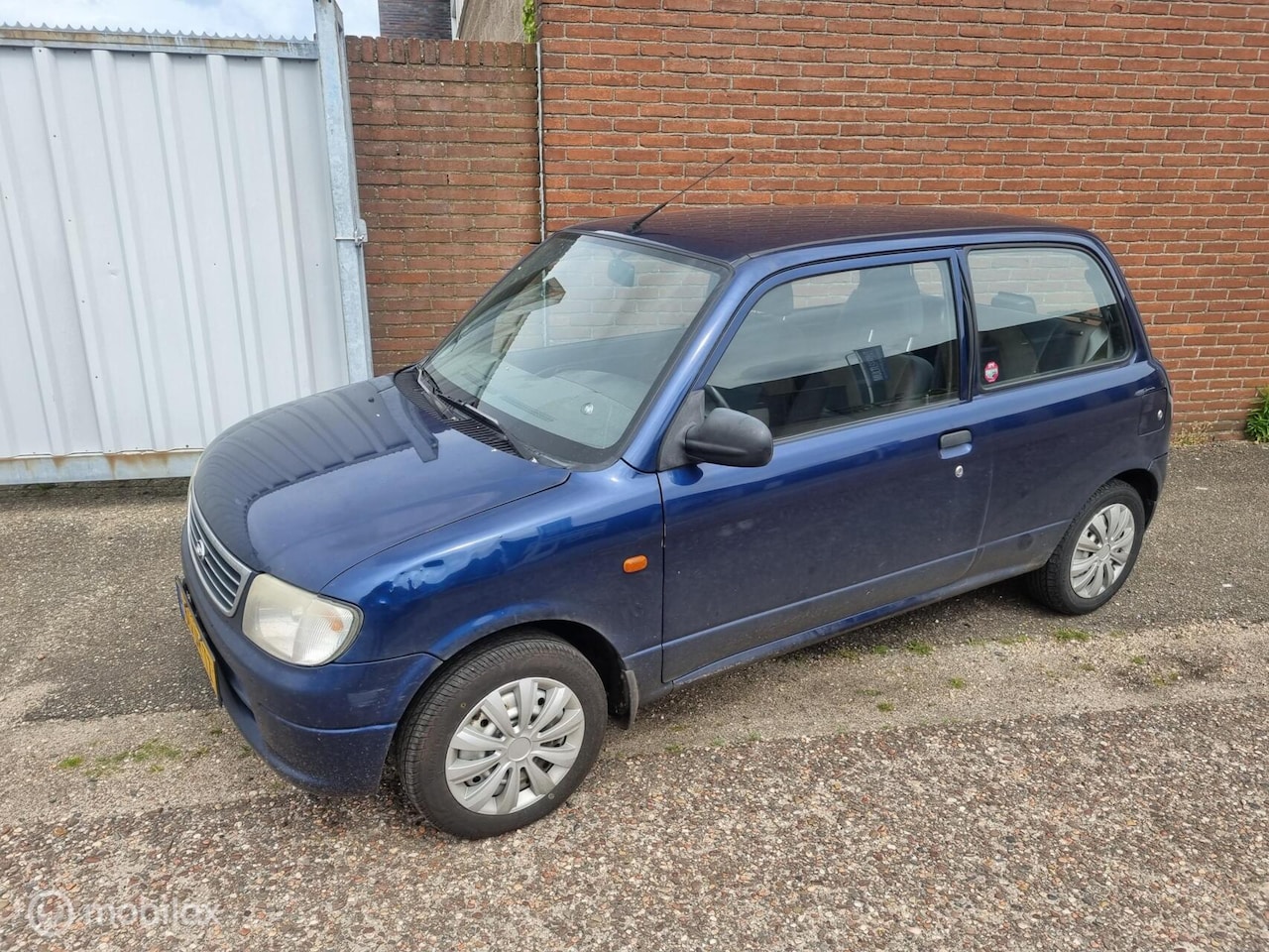 Daihatsu Cuore - 1.0-12V DVVT RTi lage km - AutoWereld.nl