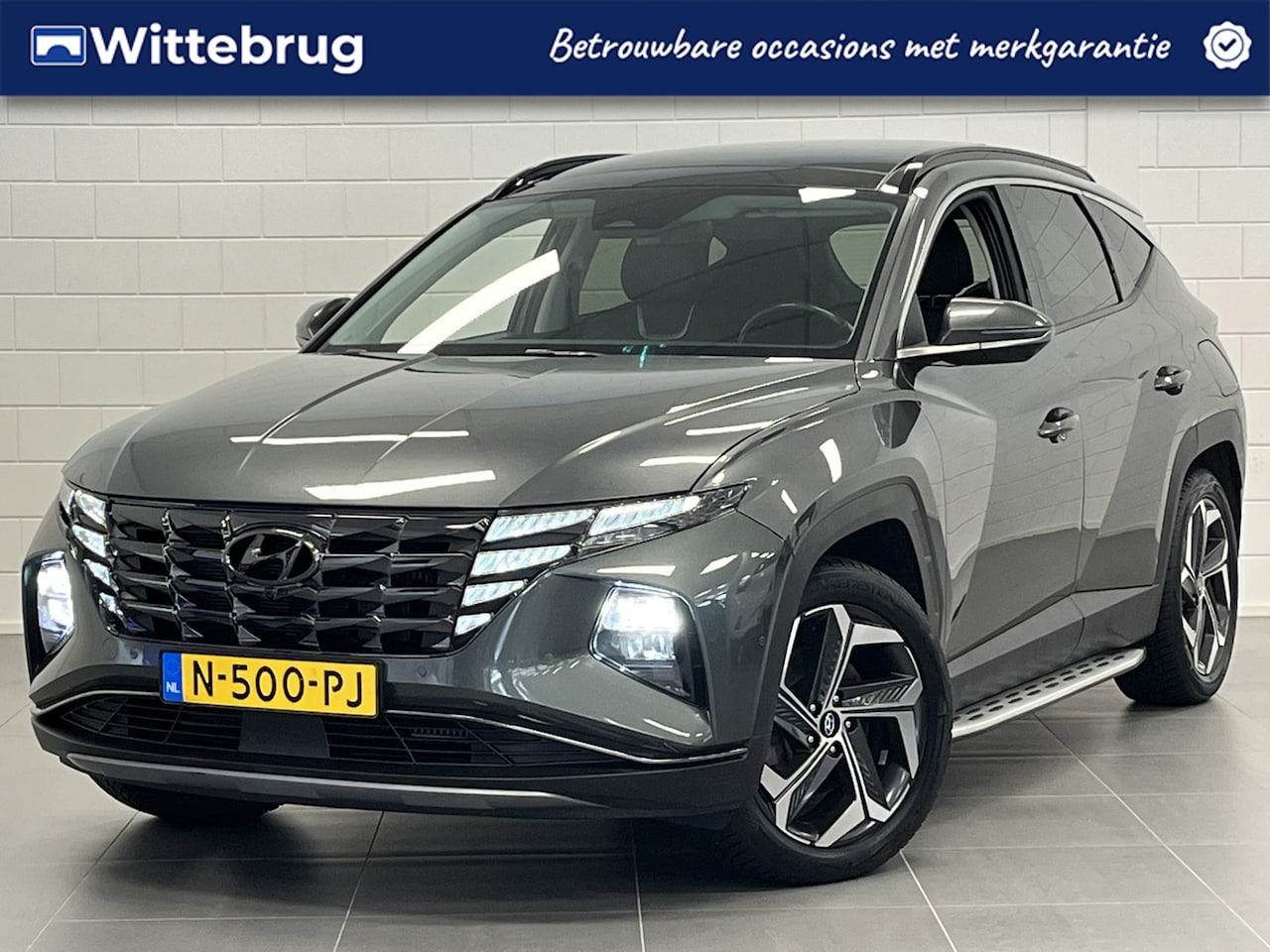 Hyundai Tucson - 1.6 T-GDI PHEV Premium Sky 4WD LEDER | TREKHAAK | SIDE STEPS | DIKKE UITVOERING! | 100% DE - AutoWereld.nl