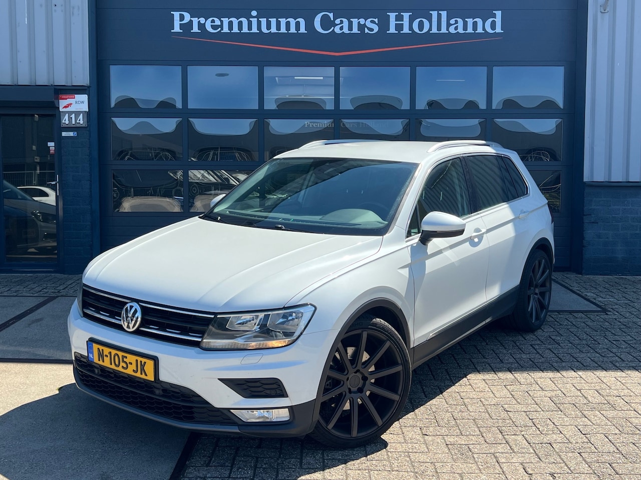 Volkswagen Tiguan - 2.0 TSI 4Motion Highline Navi Camera Keyless 21 Inch - AutoWereld.nl