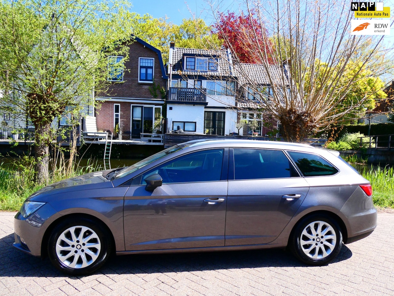SEAT Leon ST - 1.0TSI Style 116pk Clima Cruise LED Navi PDC Trekhaak - AutoWereld.nl