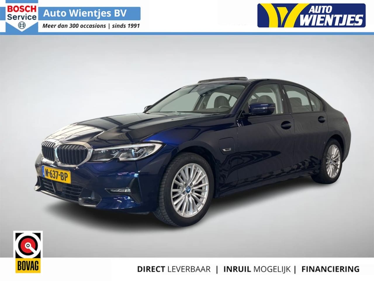 BMW 3-serie - 320e | Business Plus | Leer | Schuifdak | Navi | Camera - AutoWereld.nl