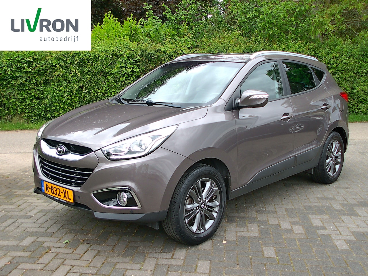 Hyundai ix35 - 1.6i GDI Business Edition Incl. APK, onderhoud, Garantie! Trekhaak, cruise control, camera, stoelverwarming - AutoWereld.nl