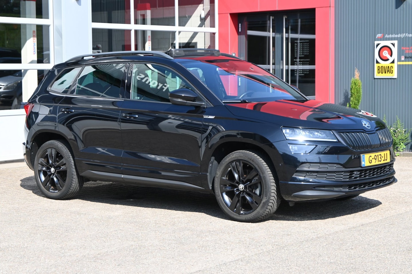 Skoda Karoq - 1.5 TSI 150pk ACT Sportline Business | Panodak schuif/-kanteldak | Apple CarPlay - AutoWereld.nl