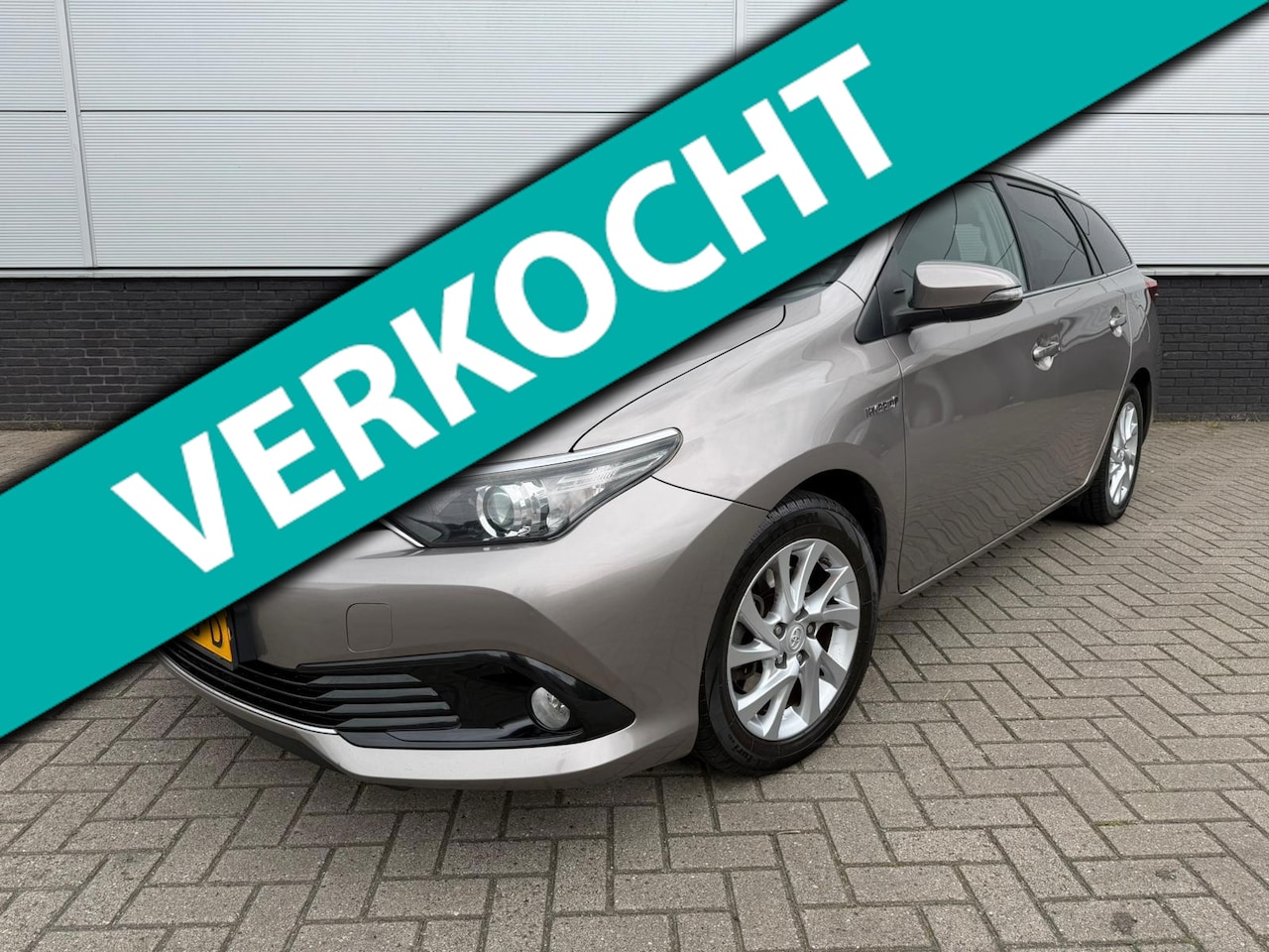 Toyota Auris Touring Sports - 1.8 Hybrid Lease Clima - Full map navi - clima - NAP - Orig. NL-auto - cruise control - bl - AutoWereld.nl