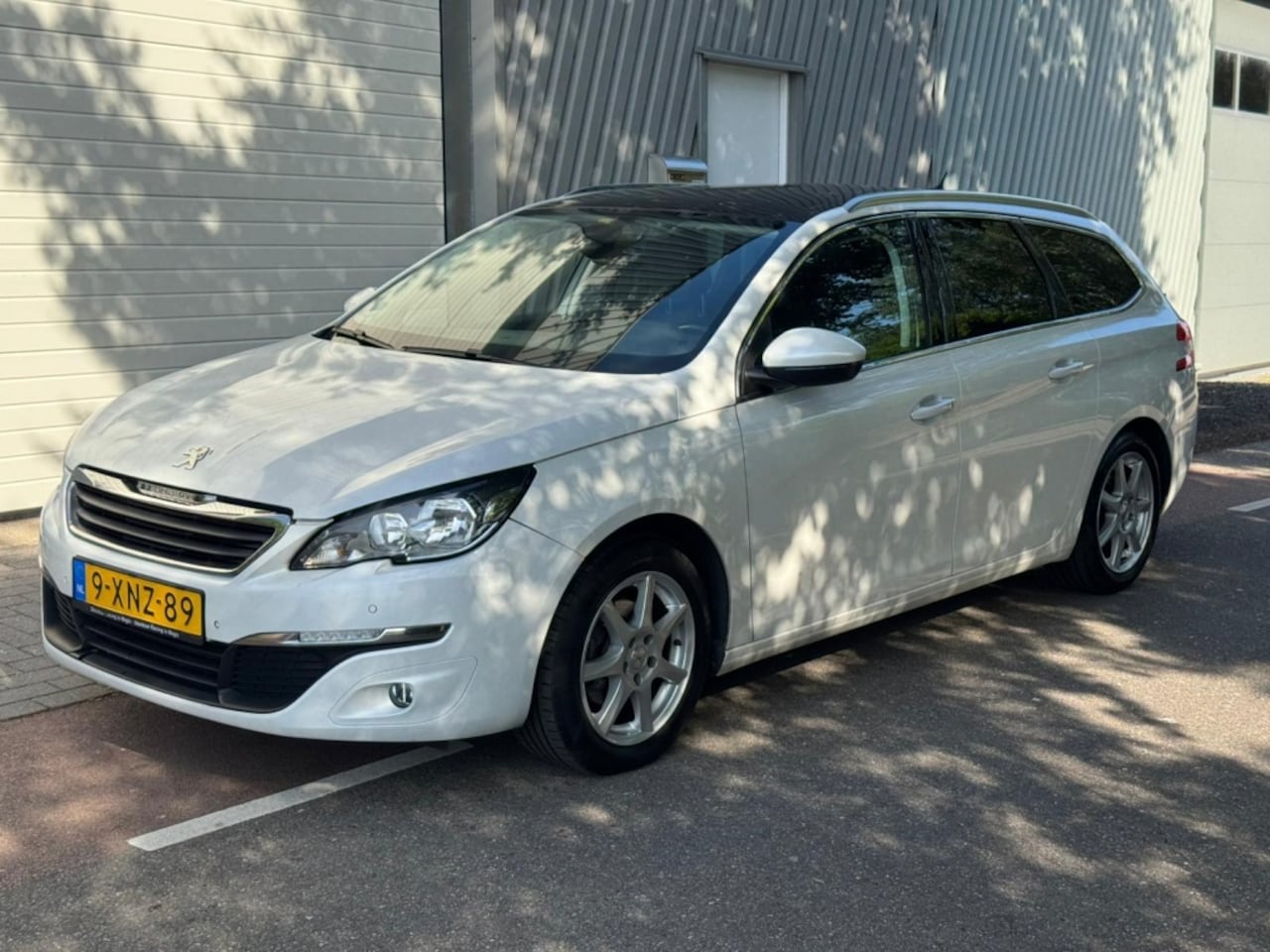 Peugeot 308 SW - 1.6 BlueHDI B. L. Ex - AutoWereld.nl
