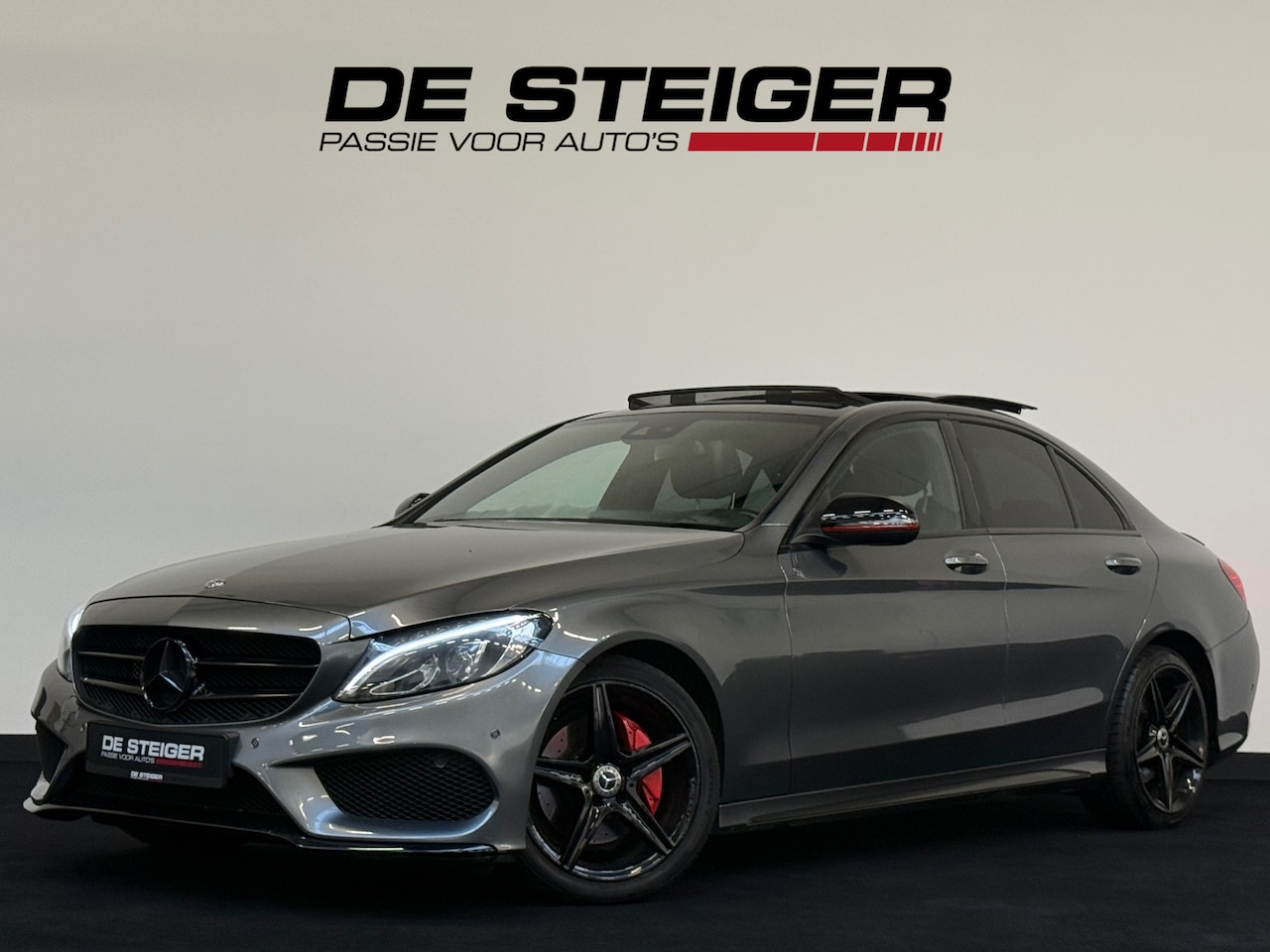 Mercedes-Benz C-klasse - 180 AMG Night Pano Keyless Camera Sfeer - AutoWereld.nl
