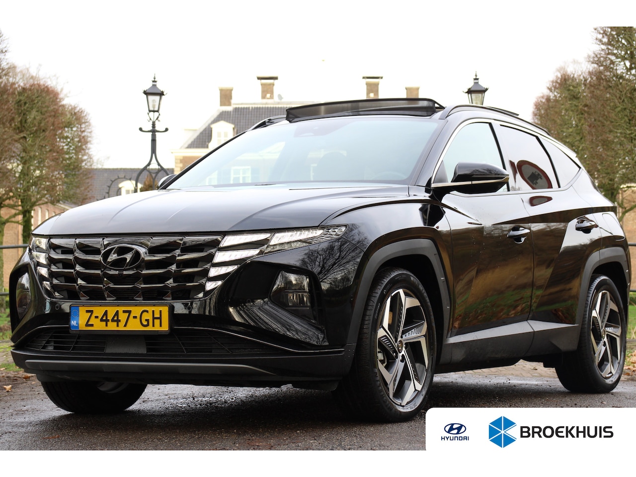 Hyundai Tucson - 1.6 T-GDI PHEV 265pk Premium Sky 4WD | Leder | Schuif-Kanteldak | Carplay | Climate | Navi - AutoWereld.nl