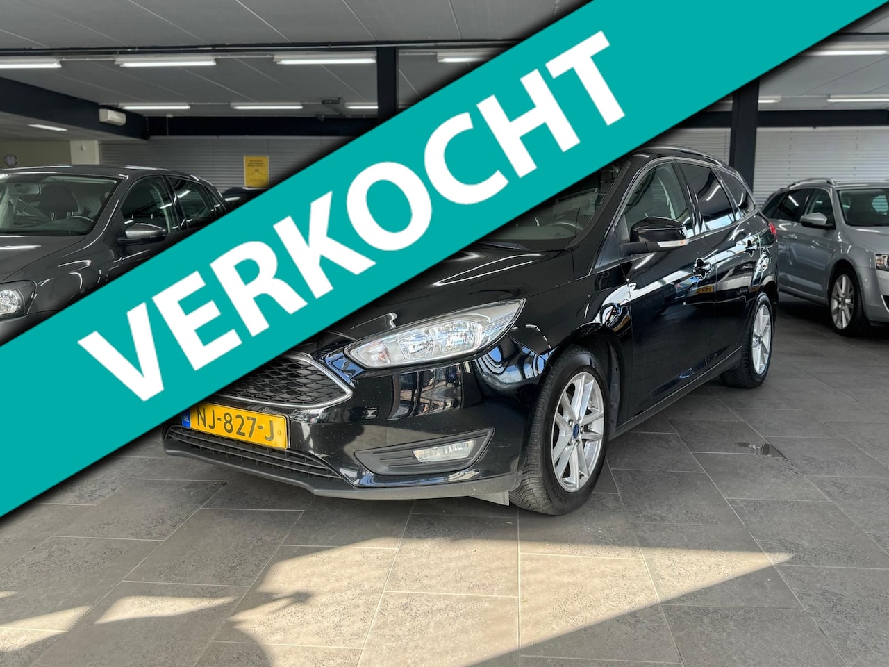 Ford Focus Wagon - 1.5 TDCI Titanium navigatie clima cruise controle lm-velgen elektrische pakket parkeersens - AutoWereld.nl