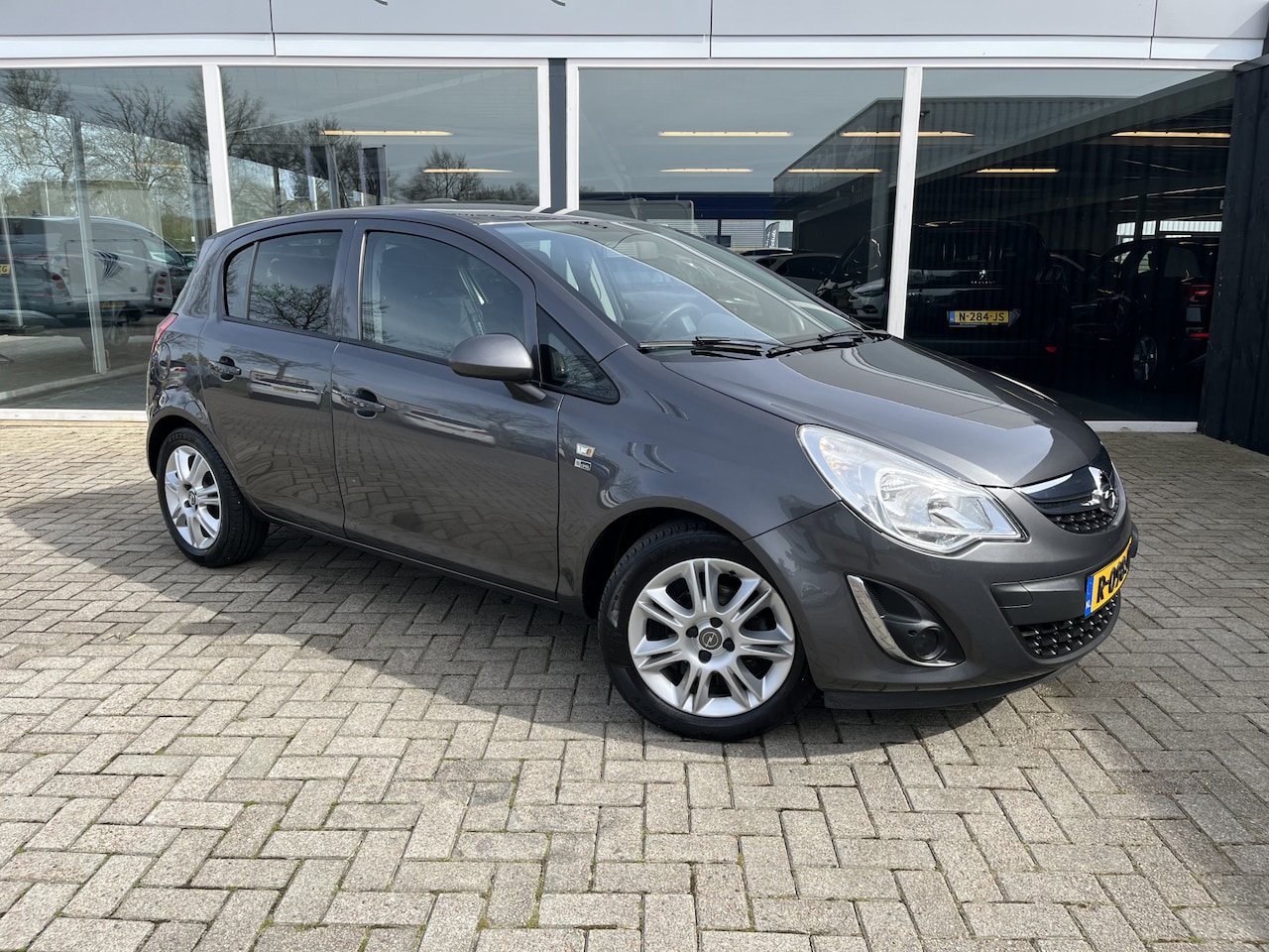 Opel Corsa - 1.4-16V Fietsendrager / Lmv /Cruise / Nav / Stoel+stuur verwarming / Airco - AutoWereld.nl