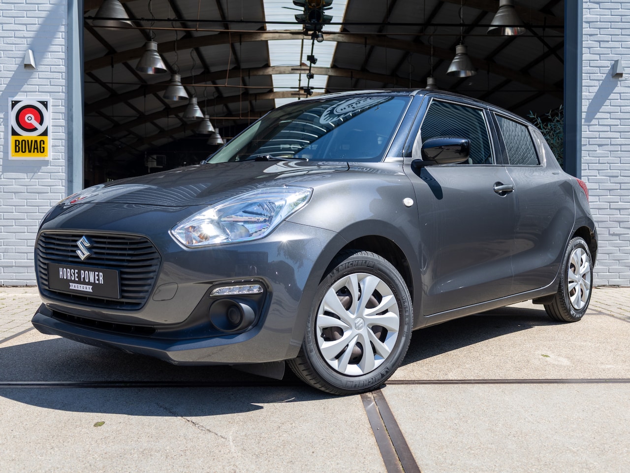 Suzuki Swift - 1.2 Comfort *Eerste eigenaar* *A/C | Bluetooth | Elek. ramen | Metallic | Stuur Leder | Au - AutoWereld.nl