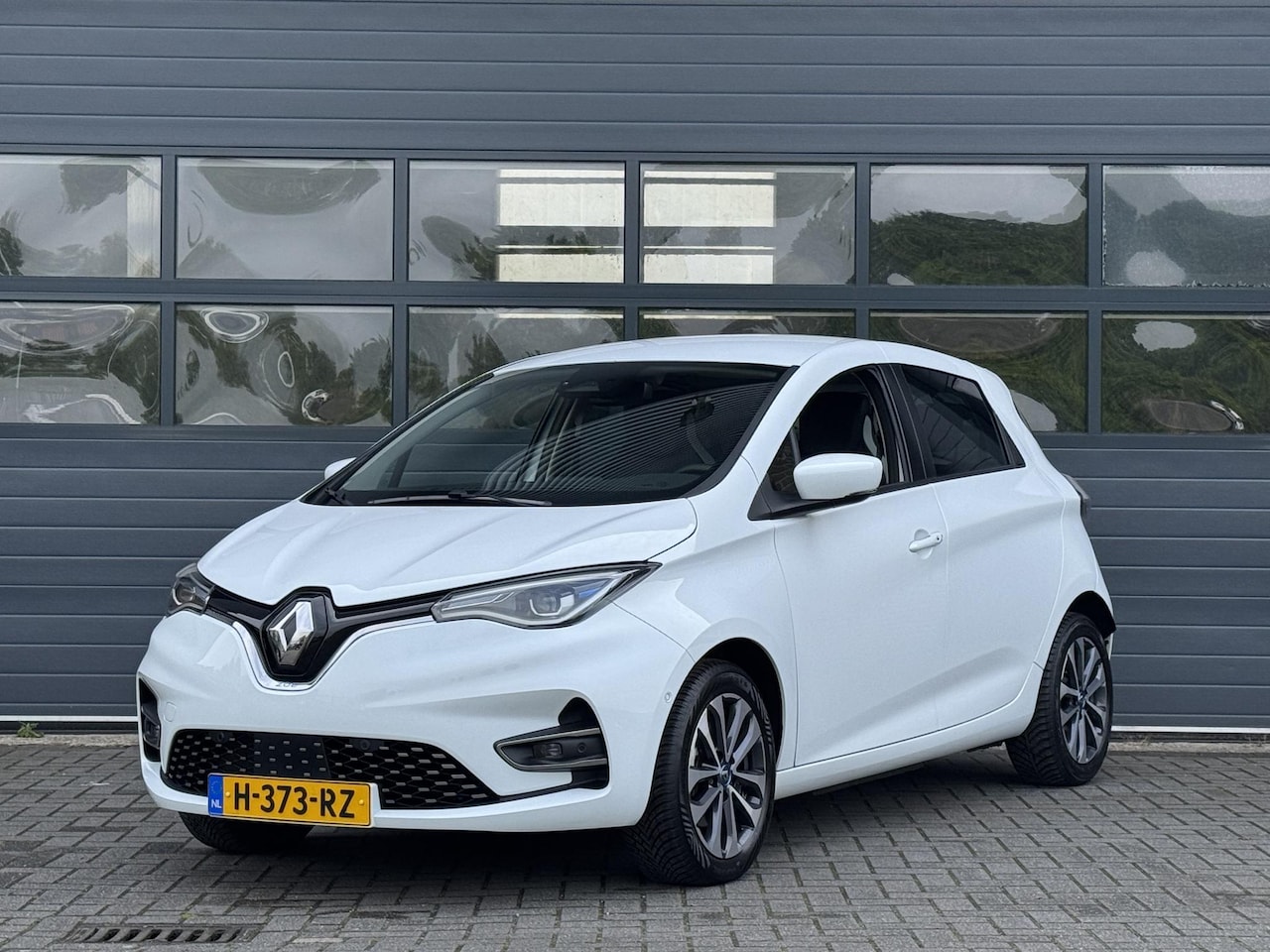 Renault Zoe - R135 INTENS BUSINESS 52 KWH (92% SOH) I KOOPACCU I AUTOMAAT I APPLE CARPLAY I P-CAMERA I C - AutoWereld.nl