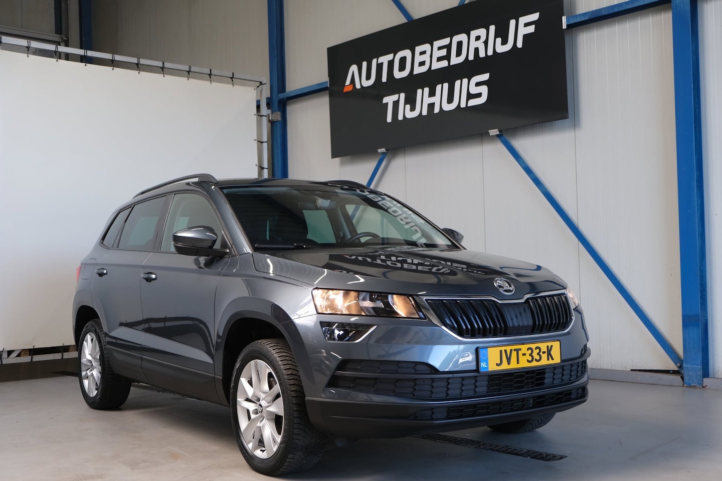 Skoda Karoq - 1.0 TSI Style - Airco, Cruise, Navi, PDC, Carplay, Trekhaak. - AutoWereld.nl