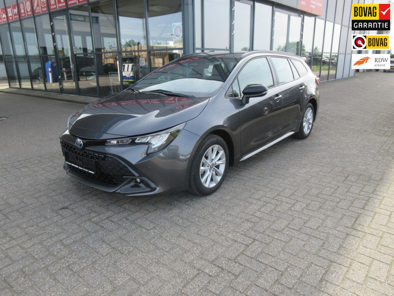 Toyota Corolla Touring Sports - Hybrid 140 Active,verwarmbare stoelen en stuurwiel,draadloos gsm laden,etc.. - AutoWereld.nl