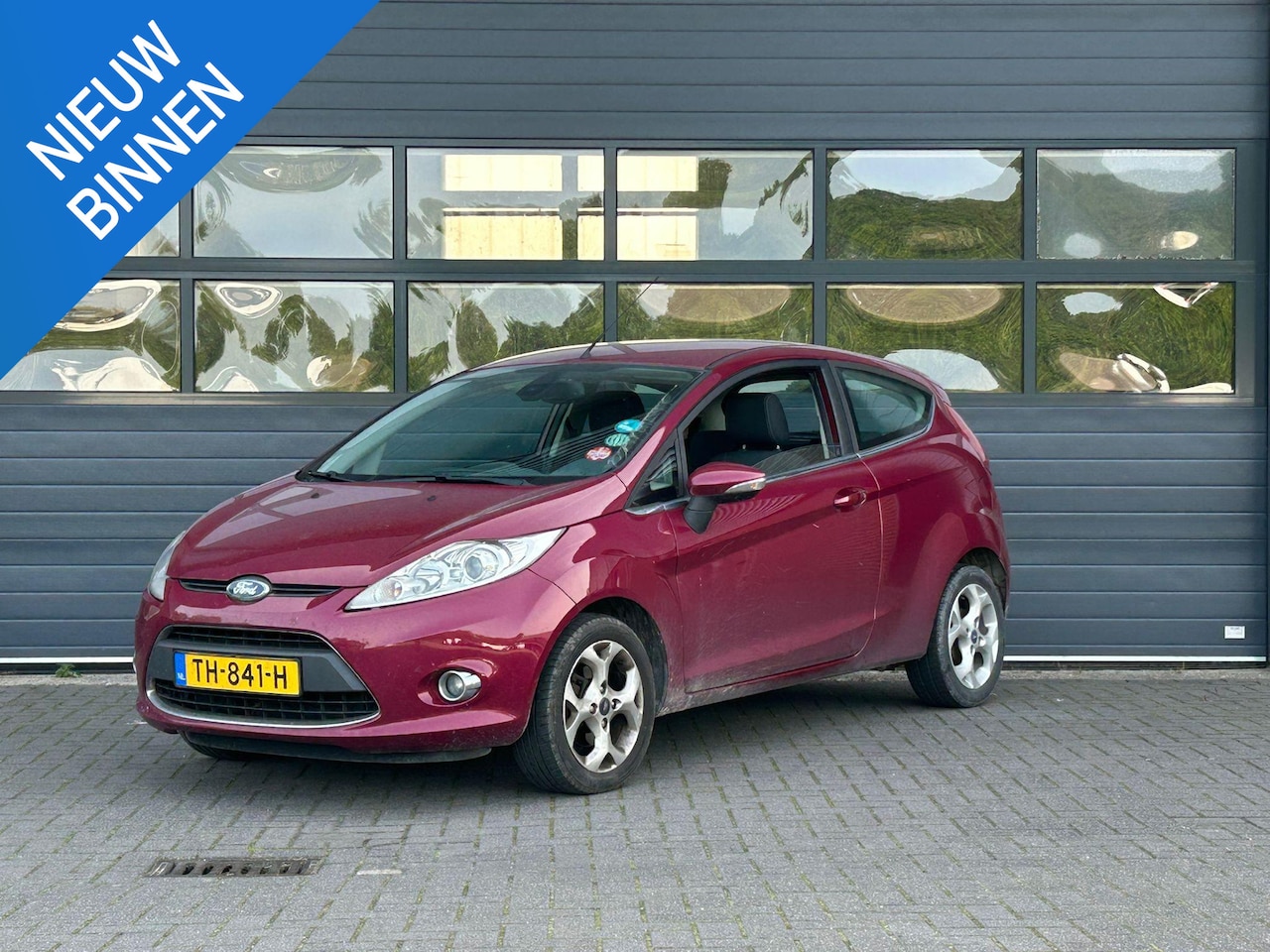 Ford Fiesta - 1.4 GHIA I MEENEEMPRIJS - AutoWereld.nl