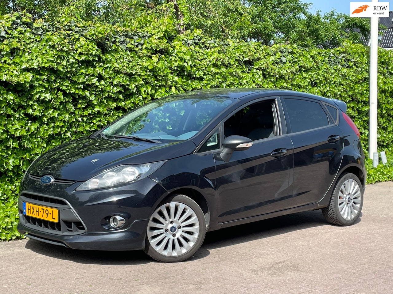 Ford Fiesta - 1.25 Trend AIRCO, 16''LM, 5-deurs! 101 DKM, Zwart. - AutoWereld.nl