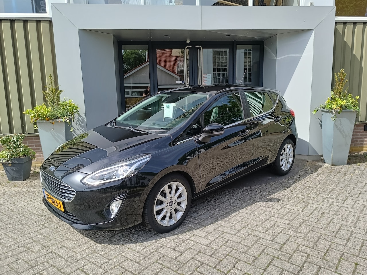 Ford Fiesta - 1.0 EcoBoost Titanium | Airco | Cruise controle | Trekhaak | LM velgen | - AutoWereld.nl