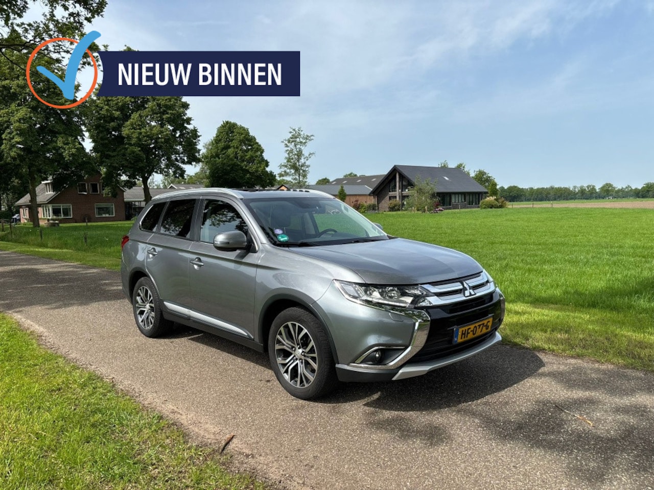 Mitsubishi Outlander - 2.0 Instyle 4WD | 7-persoons | Leder | Schuifdak | Trekhaak | Ca - AutoWereld.nl