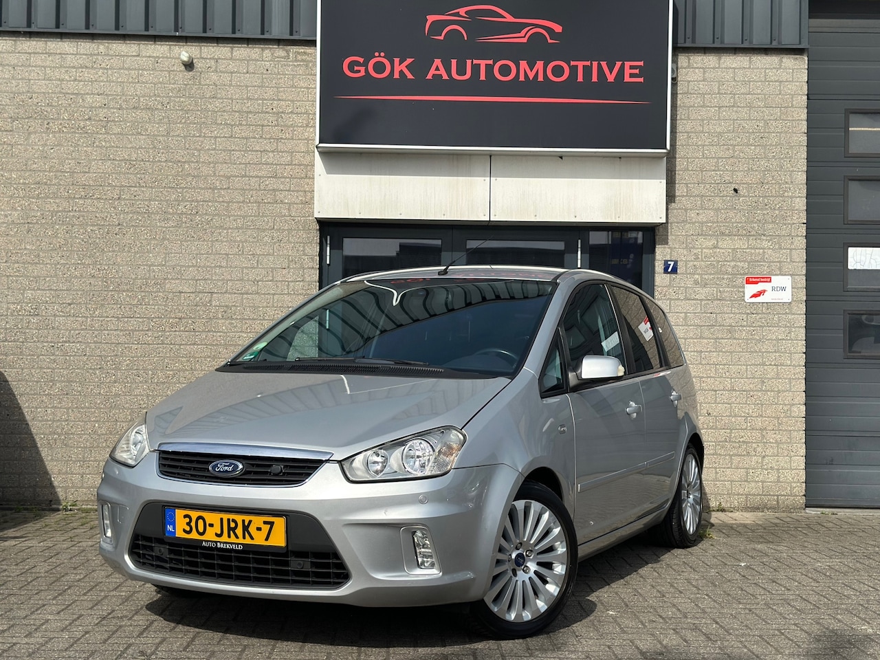 Ford C-Max - 1.8-16V Titanium Flexifuel / PDC/ Navi / Clima / NAP / Voorruit verwarming / Trekhaak - AutoWereld.nl