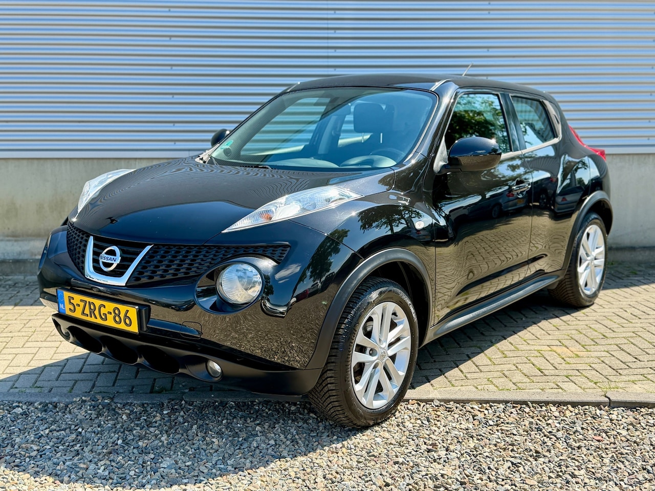Nissan Juke - 1.6 Acenta [ ecc,audio,cruise,17``lmv ] - AutoWereld.nl