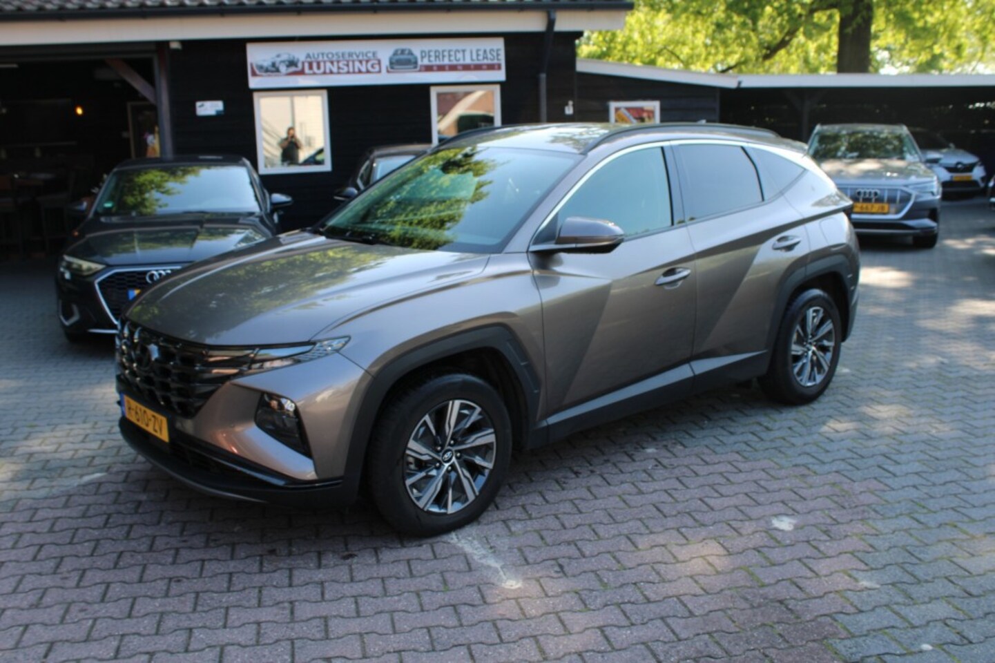 Hyundai Tucson - 1.6 T-GDI HEV Comfort Smart - camera stoelverwarming - AutoWereld.nl