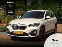 BMW X1 - sDrive20i ParelWeiss | Full Options | HUD | NavPro | Stoelverw | All wheater | Uniek