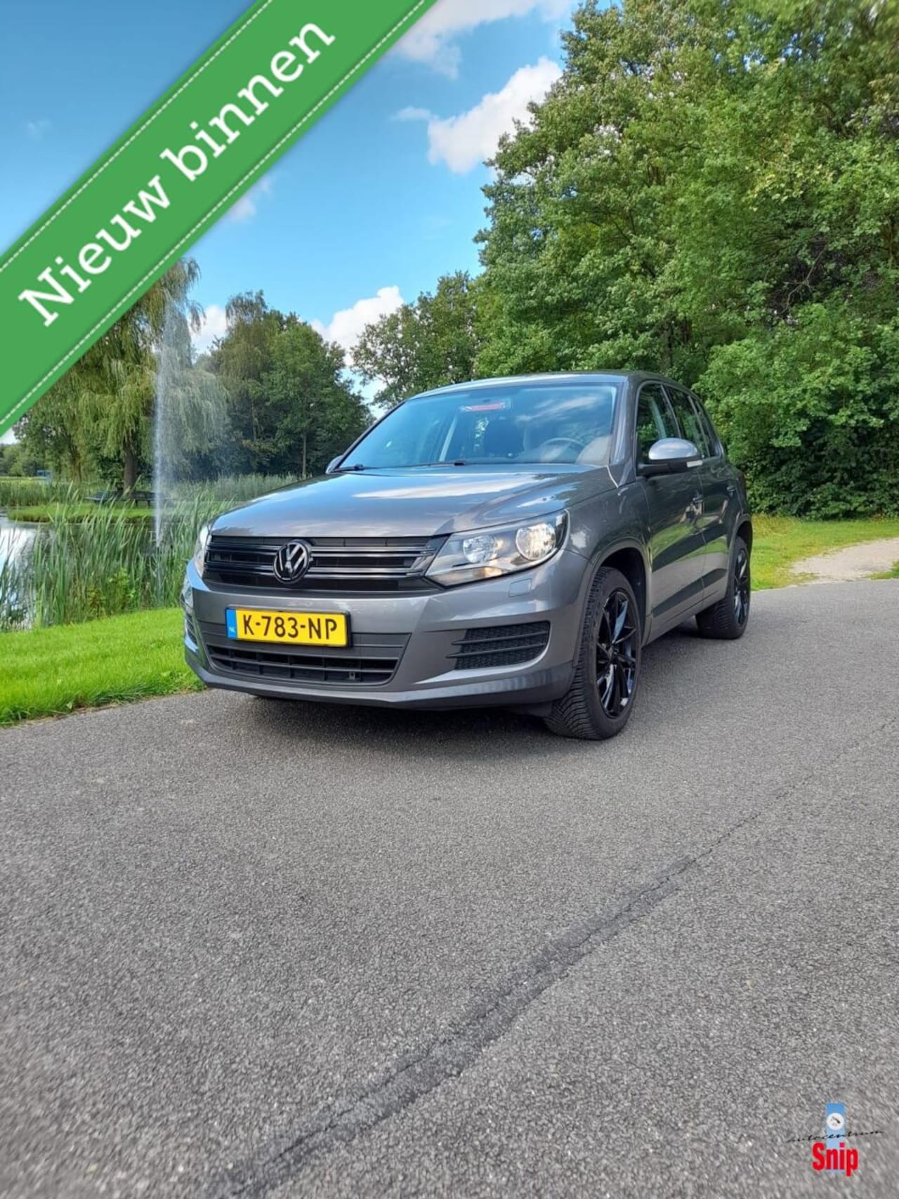 Volkswagen Tiguan - 1.4 TSI Sport&Style - AutoWereld.nl