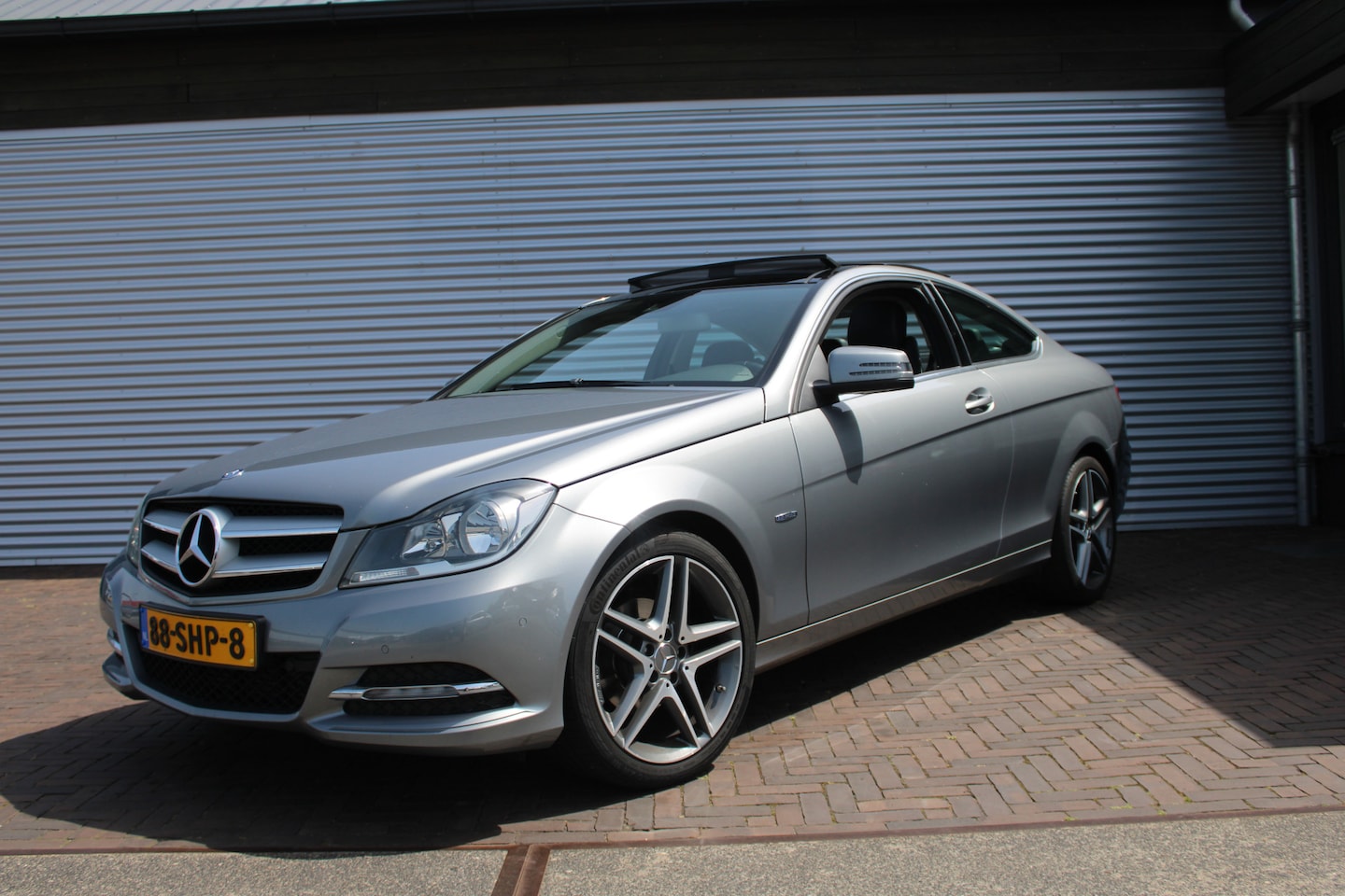 Mercedes-Benz C-klasse Coupé - 180 amg panoramadak - AutoWereld.nl