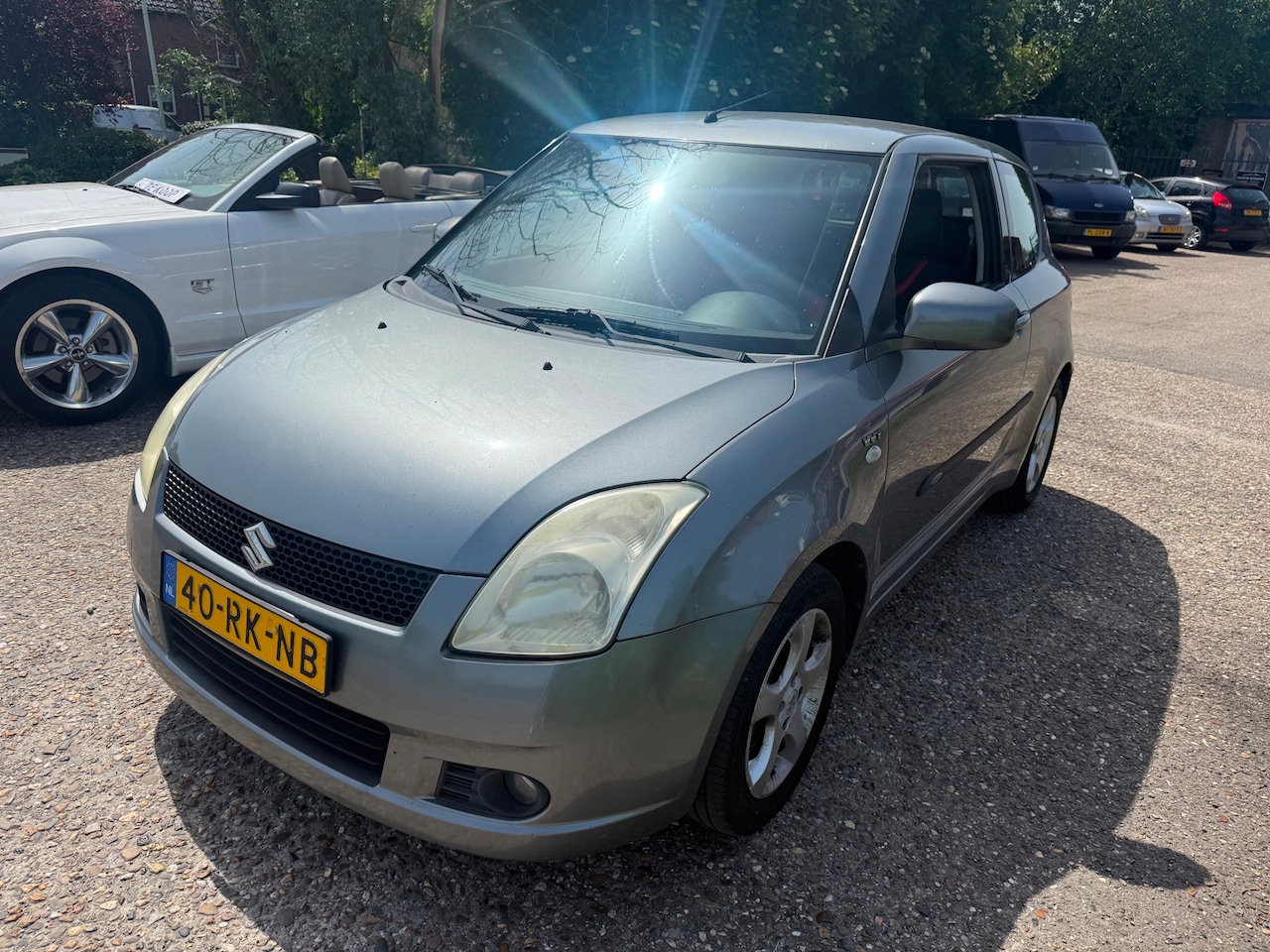Suzuki Swift - 1.5 Exclusive auto is netjes met airco - AutoWereld.nl