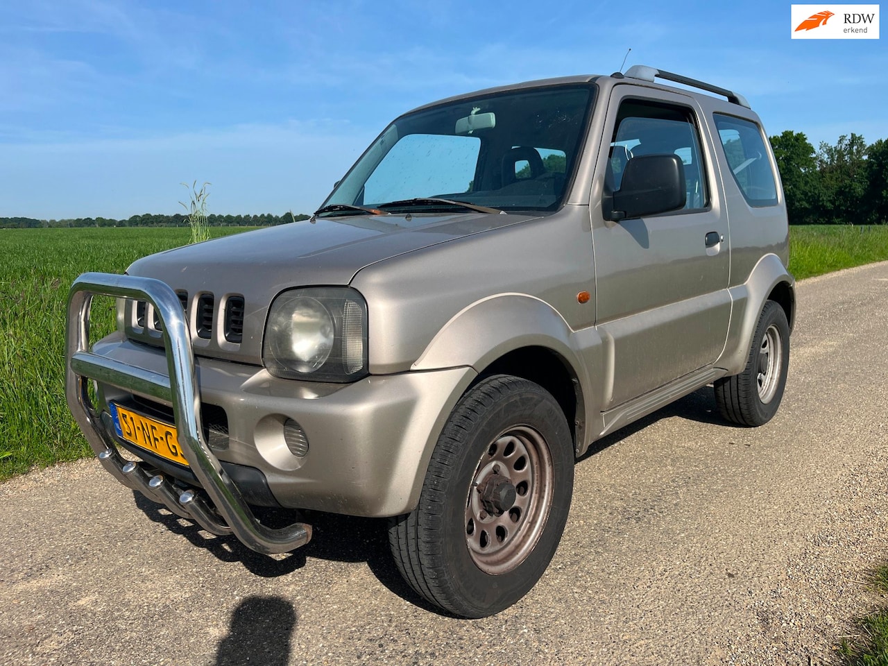 Suzuki Jimny - 1.3 JLX 2 x 4x4 EXPORT CROSS HOBBY - AutoWereld.nl