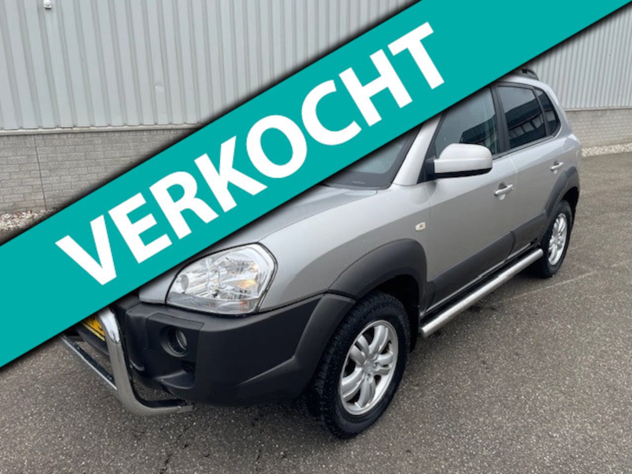Hyundai Tucson - 2.0i Dynamic 2.0i Dynamic - AutoWereld.nl