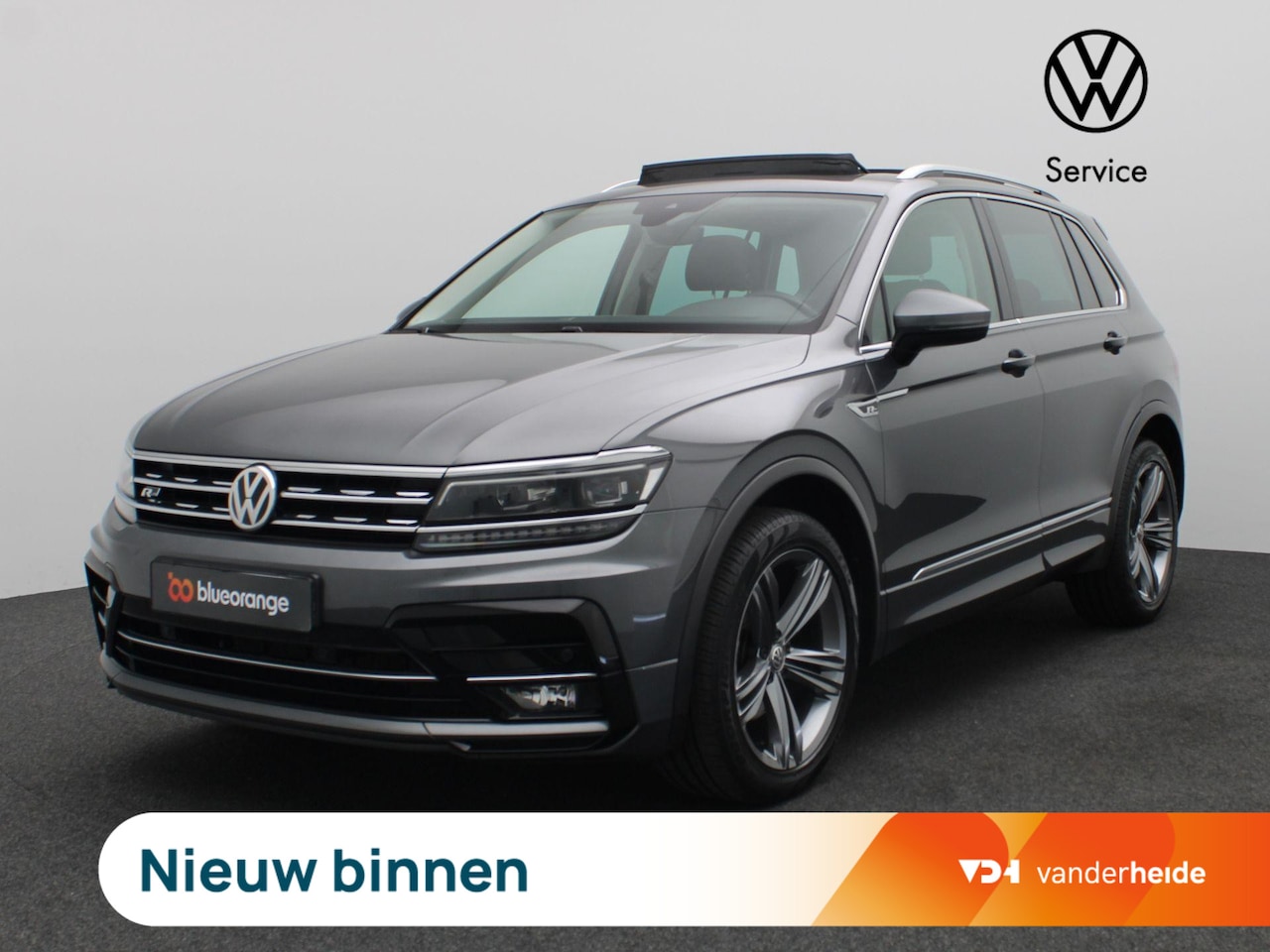 Volkswagen Tiguan - 1.4 TSI 4Motion Highline 150PK DSG R-Line, Panoramadak, Trekhaak, 19" LM Velgen, Stoelverw - AutoWereld.nl