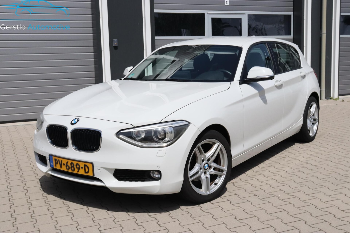 BMW 1-serie - 116i Camera Leer Navi - AutoWereld.nl