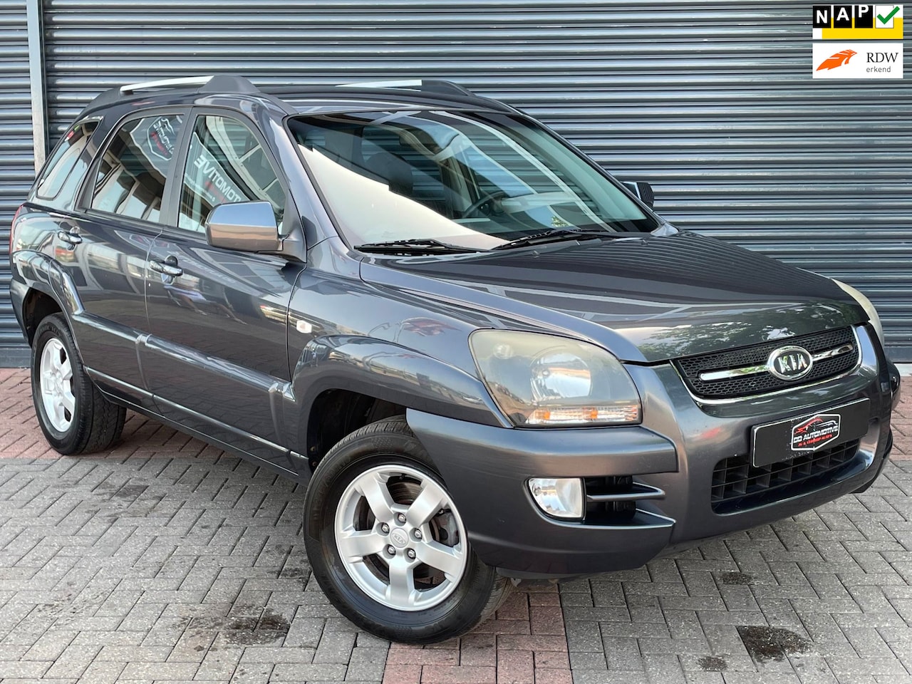Kia Sportage - 2.0 CVVT X-ecutive Cruise | Climate Control | Elektr Pakket - AutoWereld.nl