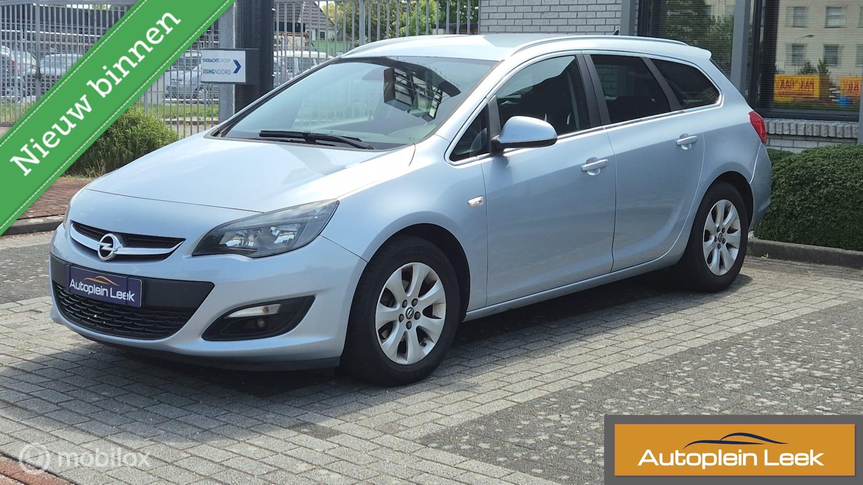 Opel Astra Sports Tourer - 1.4 Turbo Edition trekhaak clima - AutoWereld.nl