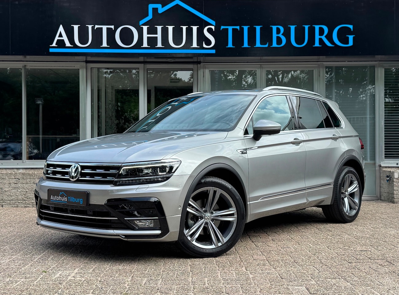 Volkswagen Tiguan - 1.5 TSI 3x R-Line Pano Leder Navi Keyless - AutoWereld.nl