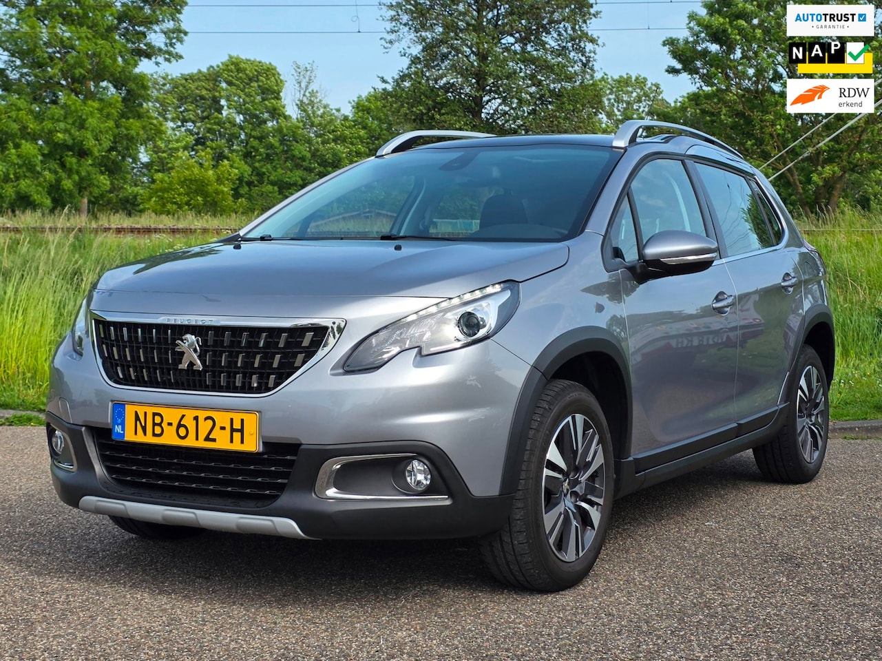 Peugeot 2008 - 1.2 PureTech Allure |AUTOMAAT|PANO|CLIMA|CAMERA - AutoWereld.nl