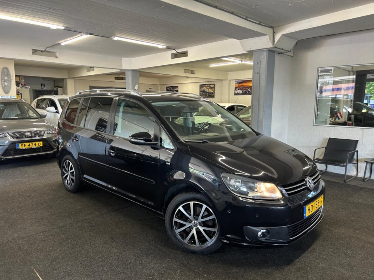 Volkswagen Touran - 1.2 TSI Highl. BM*7persoons*Navi*Trekhaak - AutoWereld.nl