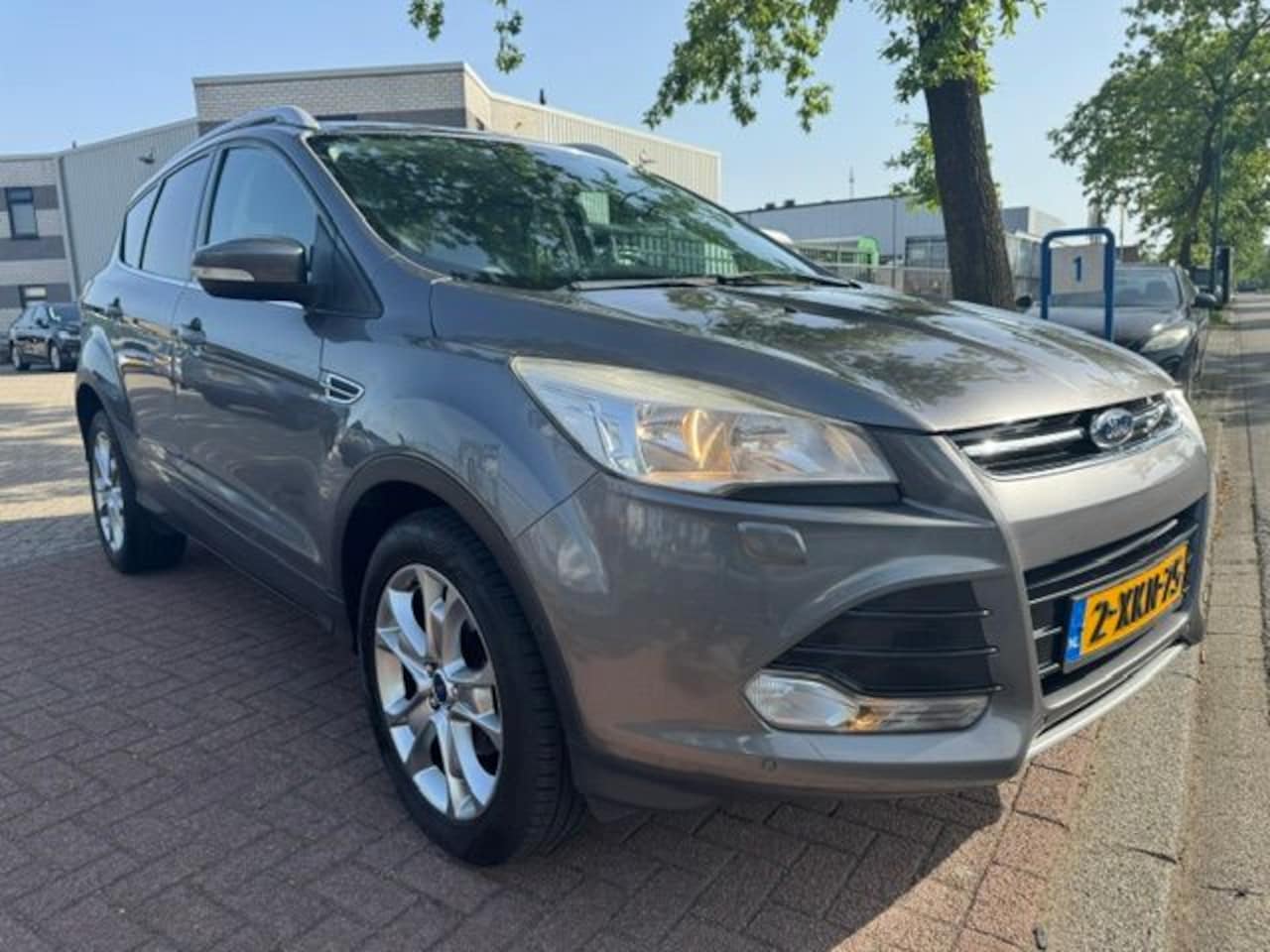 Ford Kuga - 1.6 150pk Titanium X-Pack 169.000km Airco/ECC,Navi,Camera,Half Leder - AutoWereld.nl