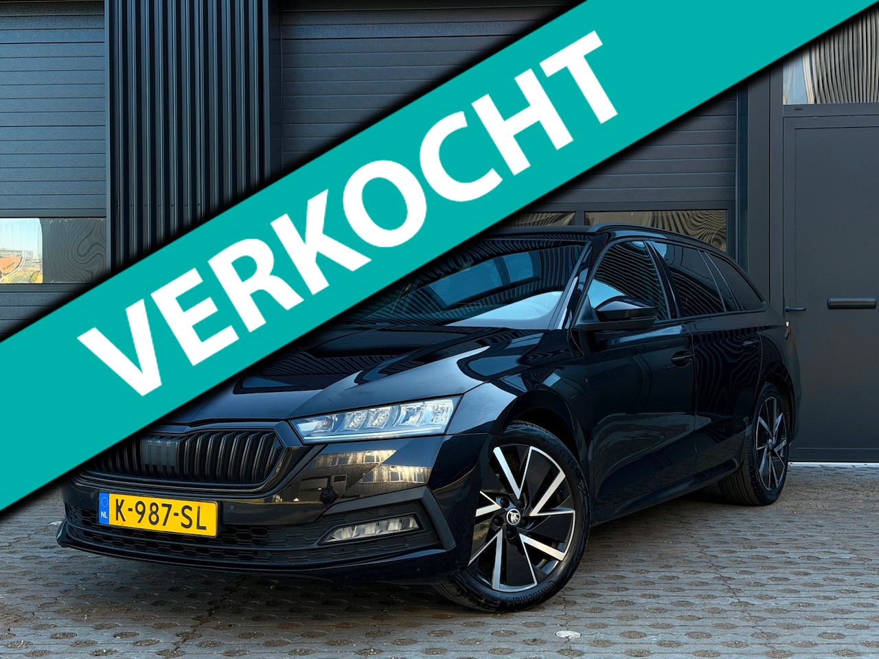 Skoda Octavia Combi - 1.0 TSI Sport Business | Dealerondh - AutoWereld.nl